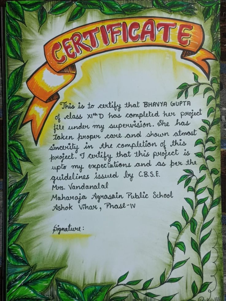 a hand painted certificate with an orange ribbon on it's border and green leaves