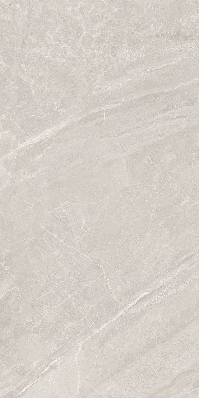 a white marble textured surface with grey veiners