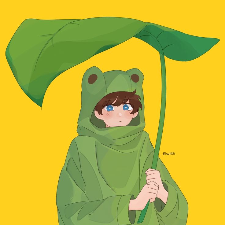 a person in a frog costume holding a green umbrella with blue eyes and brown hair