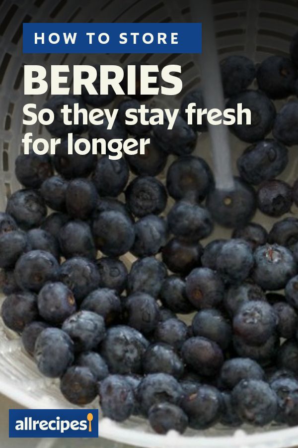 blueberries in a colander with the words how to store berries so they stay fresh for longer