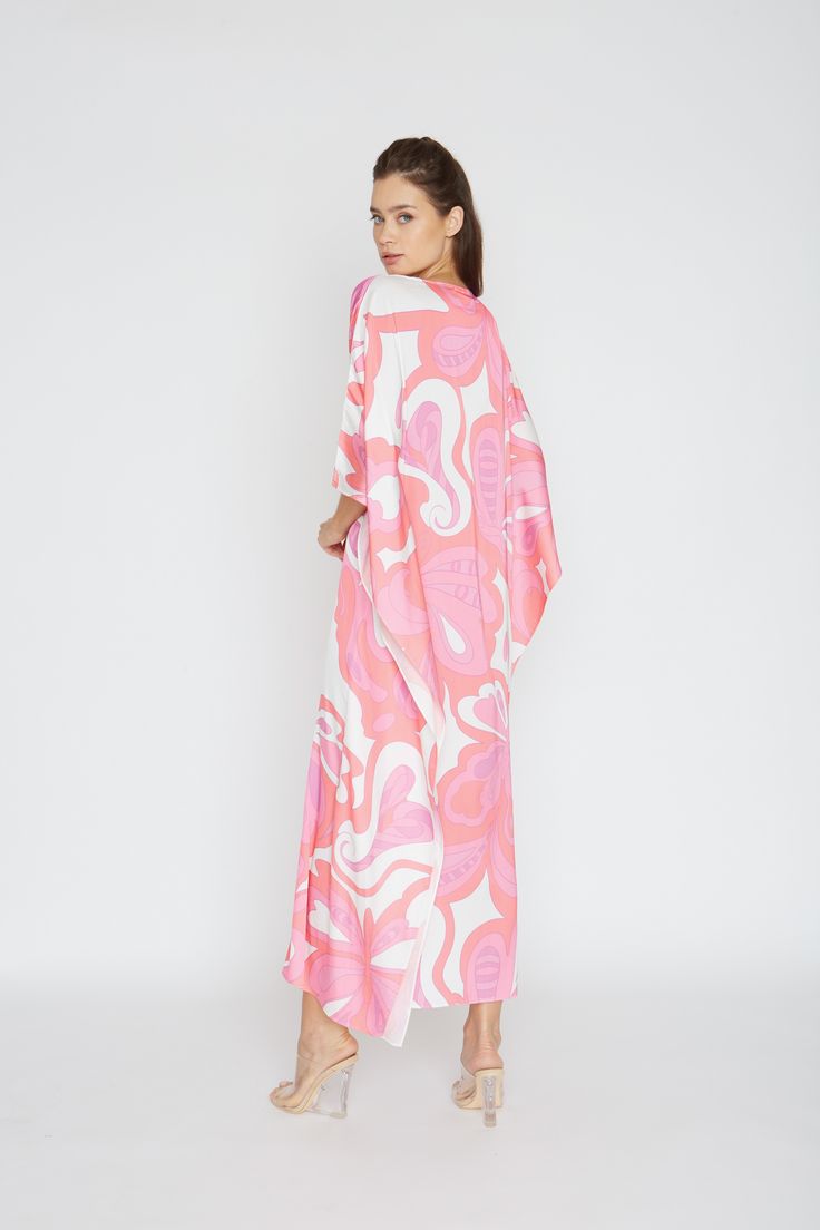 Printed long caftan Lusciously soft poly silk Lightweight and breathable Machine washable for easy care Pink Maxi Length Kimono For Spring, Chic Pink Kaftan For Vacation, Pink Beachwear Kaftan For Spring, Silk Tunic For Spring Beach Days, Silk Tunic For Spring Vacation, Silk Long Sleeve Kaftan For Beach, Casual Silk Kaftan For The Beach, White Silk Kaftan For Spring, Spring Vacation Silk Tunic