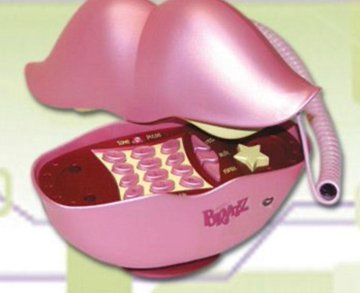 an electronic device with pink lips on it's side and its packaging in the shape of a heart