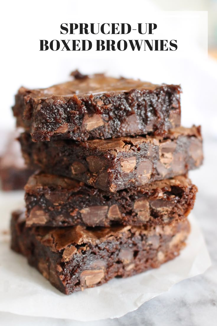 three brownies stacked up on top of each other with the words spiced up boxed brownies above them