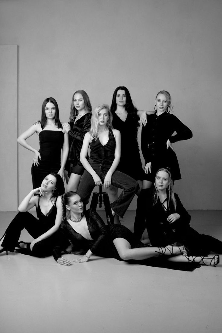 a group of women posing for a photo