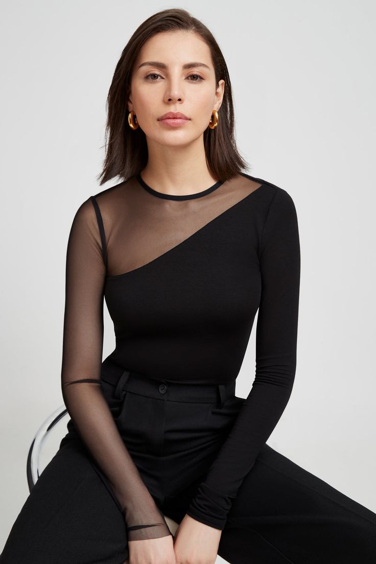 Milo Top Fitted Crew Neck Mesh Top For Party, Elegant Second-skin Tops For Night Out, Elegant Crew Neck Mesh Top For Layering, Lycra Tops For Women, Elegant Sheer Crew Neck Mesh Top, Sheer Asymmetrical Spring Tops, Sheer Asymmetrical Top For Spring, Black Second-skin Top For Party, Sleek Sheer Tops For Party