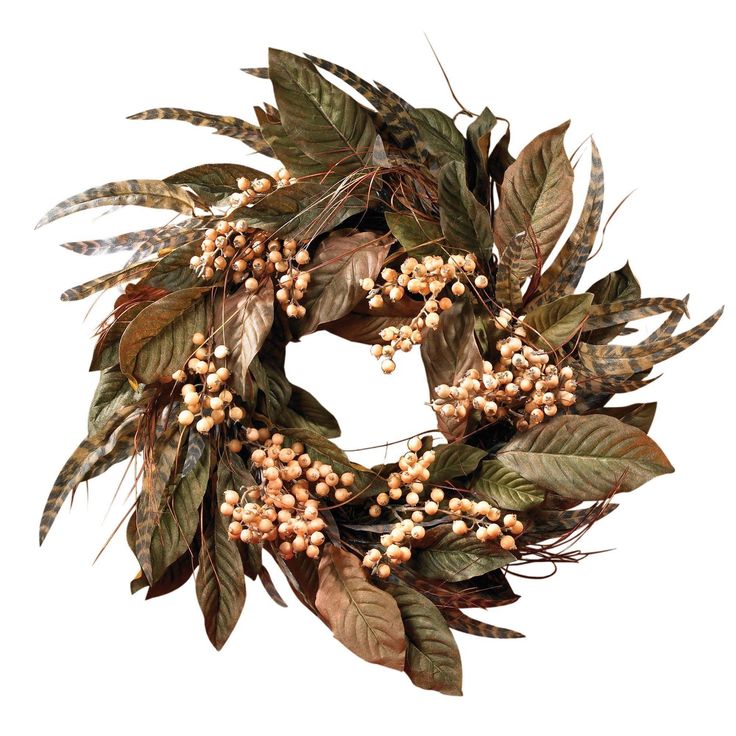 a wreath with white berries and green leaves