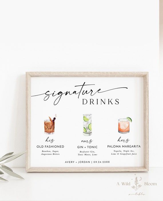 a sign that says signature drinks on the side of a white wall next to a potted plant