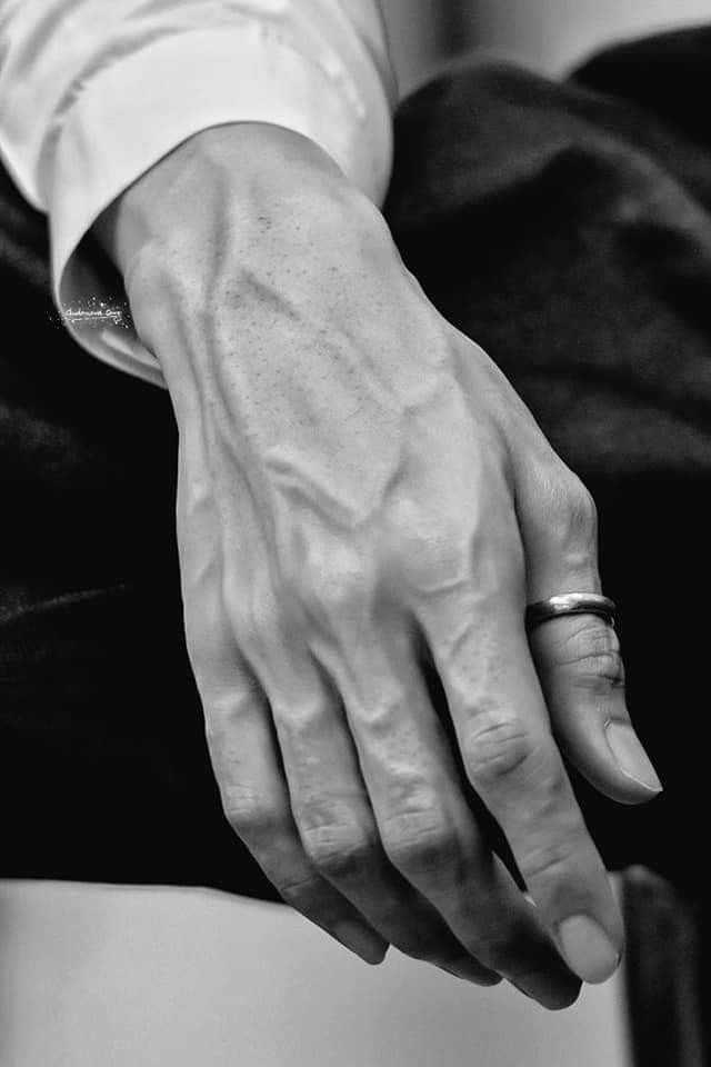 black and white photograph of a man's hands