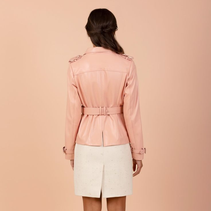 A classic leather jacket with an air of feminine sophistication. Crafted from soft 100% leather, delicately cinched at the waist by a matching leather belt with gold loops. Adorned by stunning metal and enamel ‘military’ style buttons, this piece reaches the perfect balance between ‘cool’ and feminine. Outer: 100% leather Inner: 100% Satin Cupro Belted Leather Jacket For Office, Chic Leather Jacket With Belt For Work, Office Leather Belted Jacket, Spring Fitted Belted Leather Jacket, Spring Leather Jacket With Belted Cuffs, Spring Leather Jacket With Belted Cuffs And Long Sleeves, Chic Belted Leather Jacket For Business, Chic Leather Outerwear With Belt, Luxury Leather Belted Jacket