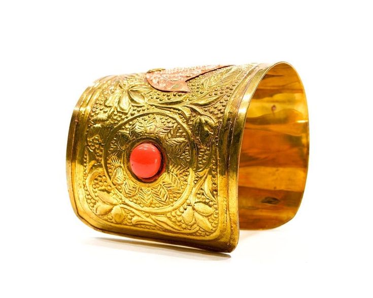 "Simply amazing boho cuff bracelet with an intricate design. Made of embossed brass, copper and two orange glass cabochons. New old stock, originally from the 1970s. Most with original sicker. Although new and never used, age has added oxidation spots, tarnish and unique character. Measures approximately 2 5/8\" at widest point, inside diameter, can be adjusted by simply flexing the cuff. NOTE: The beauty of all ethnic jewelry comes from its distinct rustic feel. There are unique variations in c Boho Cuff Bracelet, Puka Shell Necklace, Boho Cuff, Nature Necklace, Puka Shell, Copper Cuff, Flexing, Fabric Belt, Shell Necklaces