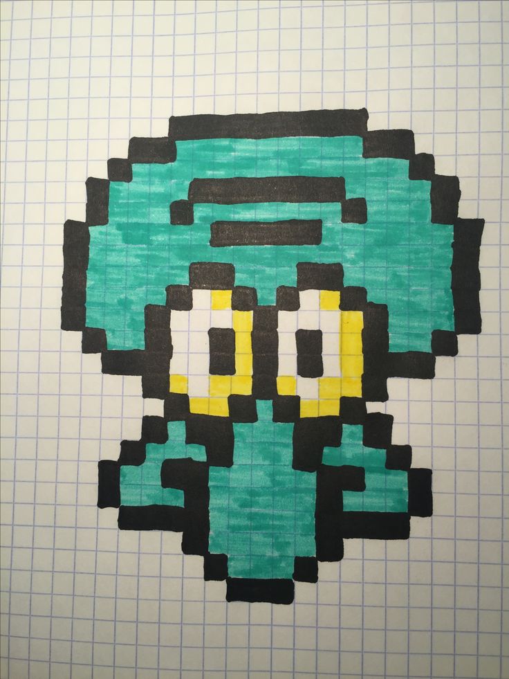 a piece of paper that has been made to look like an old school video game character