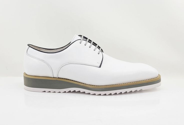 Style: 515-26-White Stylish Burnished Calfskin lace-up Derby Oxford from the Carrucci collection features soft Calfskin lining, a super lightweight Rubber Sole, and a clean welt! White Plain Toe Lace-up Shoes For Derby, White Leather Lace-up Shoes With Textured Sole, Classic White Lace-up Leather Shoes, White Leather Shoes With Textured Sole For Spring, Spring White Leather Shoes With Textured Sole, White Wingtip Lace-up Shoes For Work, Classic Leather Shoes With Contrast Sole For Spring, White Fitted Leather Shoes For Spring, White Wingtip Leather Shoes For Work