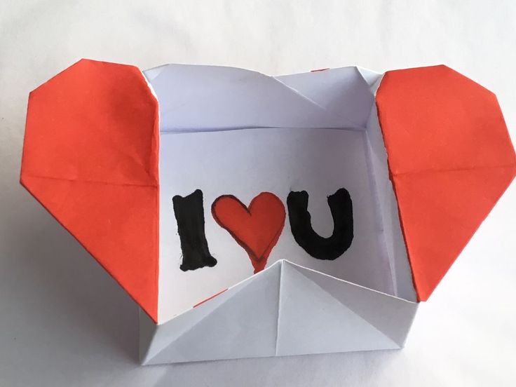 an origami elephant with the word i love you cut out of it's back