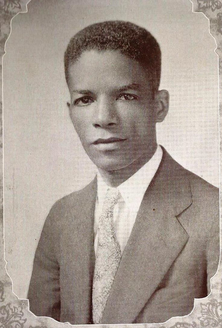 an old photo of a man in a suit and tie