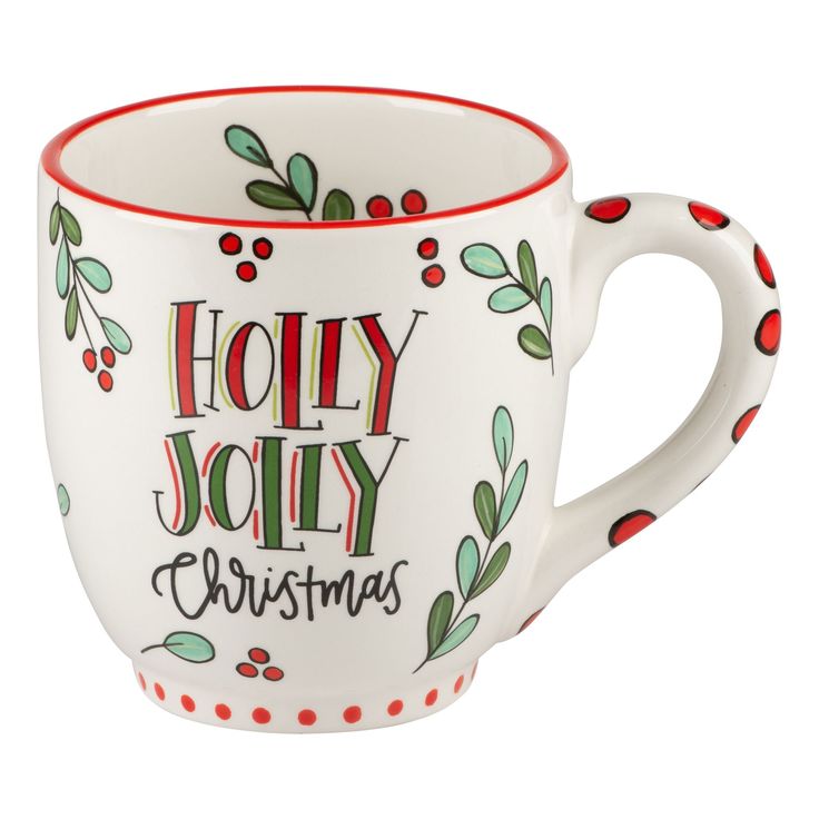 a white coffee cup with holly and red trimmings on the side, decorated with holly