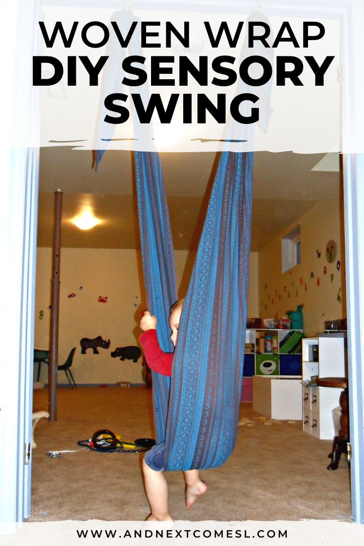 a boy is hanging upside down on a blue hammock with text overlay that reads how to make a sensory swing for kids