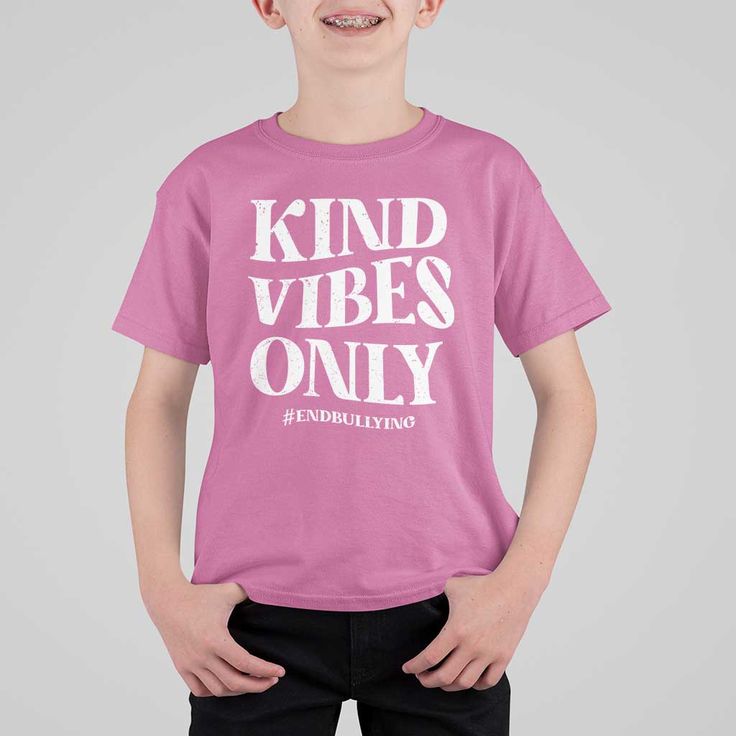 Unity Day T Shirt For Kid Kind Vibes Only End BullyingGet Ready for Anti Bullying in Style! Our Kids T-Shirts combines comfort and creativity, giving kids the freedom to showcase their unique style while enjoying all-day comfort and ease. Each shirt is custom-made to order and handcrafted to the highest quality standards. Details: Composition: 100% airlume combed and ringspun cotton. Material: Soft and durable cotton fabric. Design: Classic fit, seamless ribbed neck, double needle sleeves, and b Unity Day, Digital Graphics, Our Kids, Cotton Material, Daily Wear, Kids Tshirts, Unique Style, Color Variations, Fabric Design