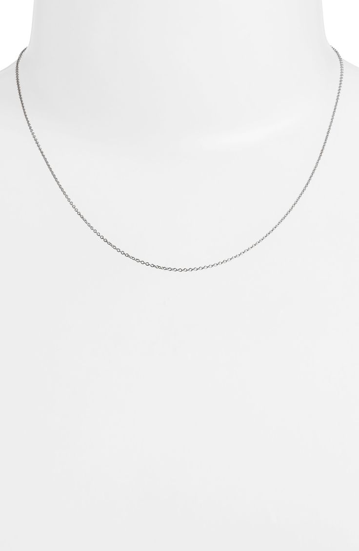 White 14-karat gold gives an icy look to this minimalist chain necklace. 17" length 14k gold Handmade in Canada Formal White Gold Delicate Chain Necklace, 14k White Gold Solitaire Necklace With Delicate Chain, Classic White Gold Necklace With Delicate Chain, Minimalist Necklace With Cable Chain And Oval Link, Silver Solitaire Necklace With Cable Chain, Minimalist Solitaire Necklace In Yellow Gold With Cable Chain, Dainty Solitaire Necklace With Cable Chain For Formal Occasions, Classic 14k Gold Solitaire Necklace With Cable Chain, Minimalist White Gold Chain Necklace As Gift