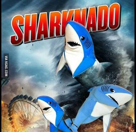 sharknado movie poster with three sharks in front of a fire and water scene