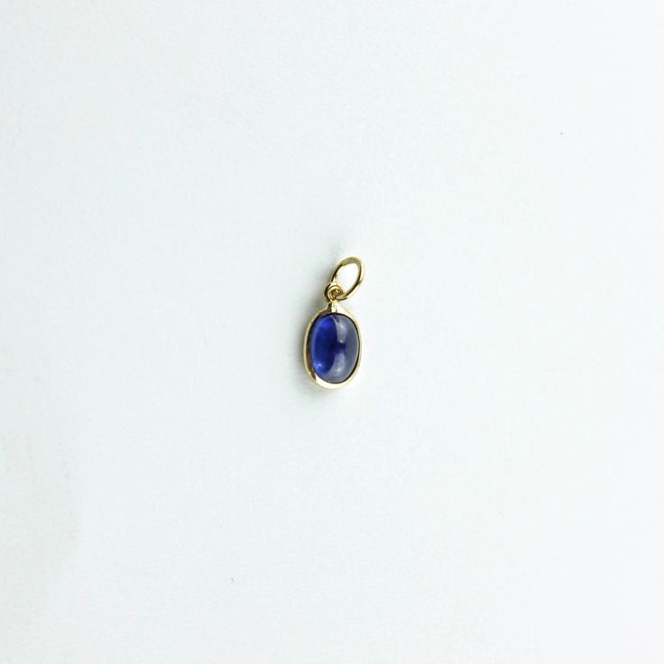 Material: 14k solid yellow gold (not gold plated or gold filled) Main Stone: Sapphire Main Stone Color: Blue Main Stone Shape: Oval Main Stone Creation: Natural Stone Size: 7x5 mm Carat Weight: 1.14 Carats Minimalist 14k Gold Oval Cabochon Jewelry, Minimalist Yellow Gold Cabochon Jewelry, Yellow Gold Polished Oval Cabochon Gemstones, Polished Yellow Gold Oval Cabochon Gemstones, Yellow Gold Oval Cabochon Gemstone With Polished Finish, Dainty Oval Cabochon Birthstone Jewelry, Minimalist 14k Gold Jewelry With Cabochon, Yellow Gold Oval Cabochon Gemstones For Anniversary, Everyday 14k Gold Oval Cabochon Jewelry