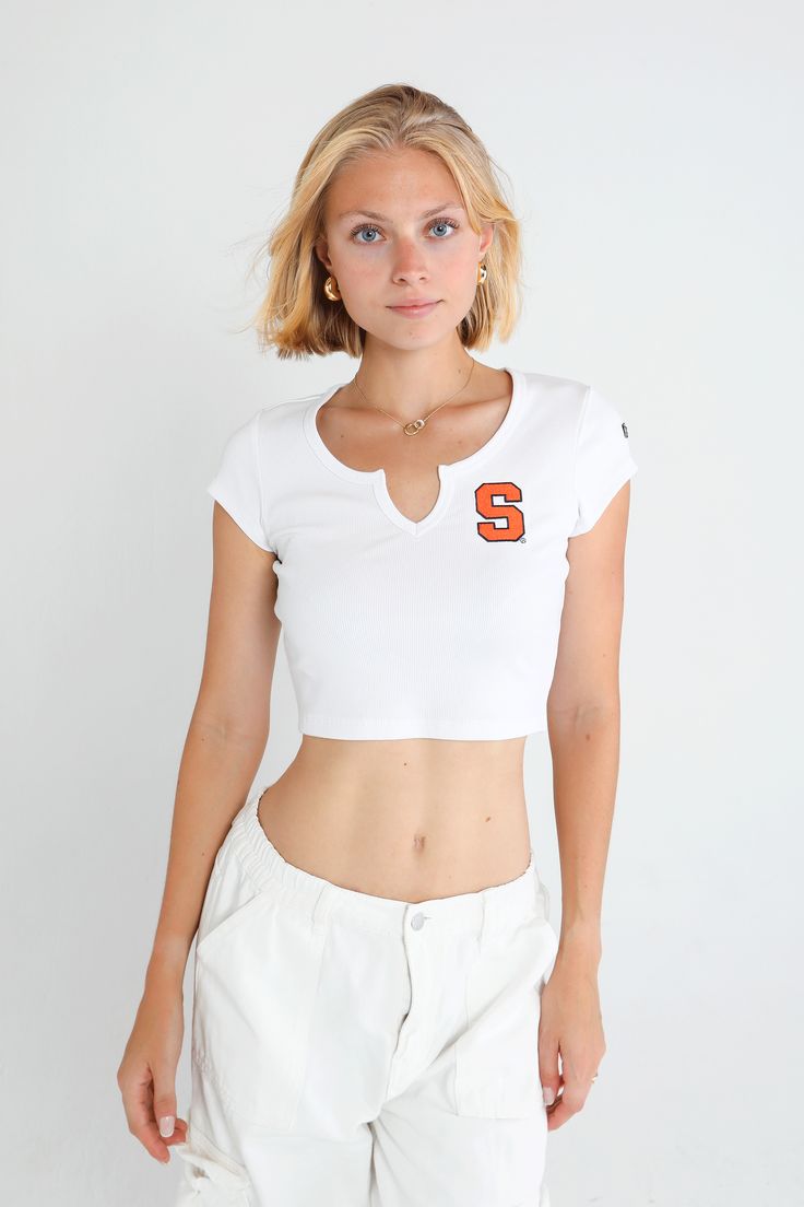 The Cali Tee! A cropped, fitted top with a V-cut front detail at the neckline. Made with fine, ribbed fabric and an embroidered finish. SIZING AND DETAILS Sizing: XS-XXL Cropped fit Form fitting 95% Supima Cotton Rib, 5% Spandex Embroidered logo application P.S. We’d love to see you repping this style! Make sure to tag us (@hypeandvice) to be featured :) Tailgate Outfits, Logo Application, Tailgate Outfit, Fitted Top, Inner Beauty, Supima Cotton, V Cut, V Cuts, Ribbed Fabric