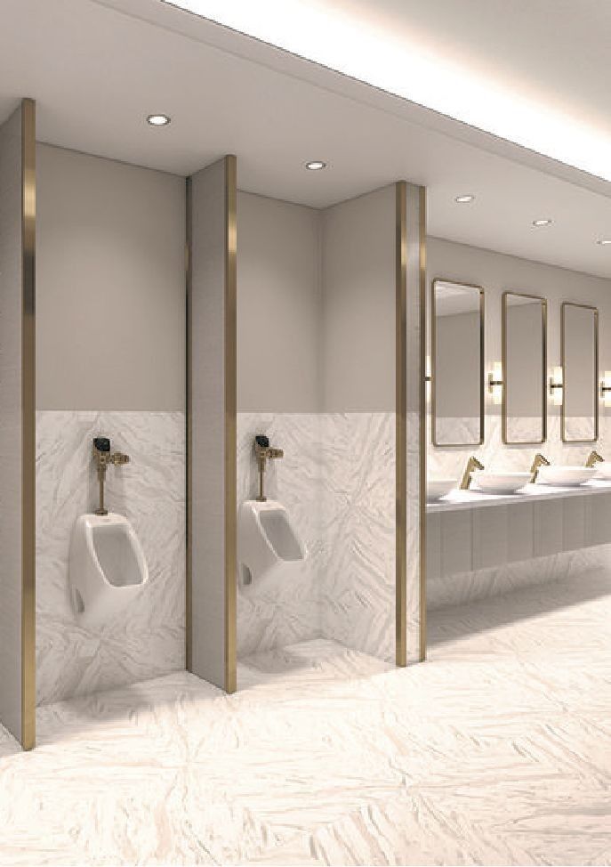 an empty public restroom with urinals and sinks