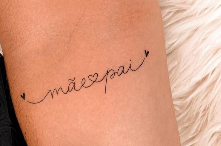 a woman's arm with the word maepa written in cursive writing