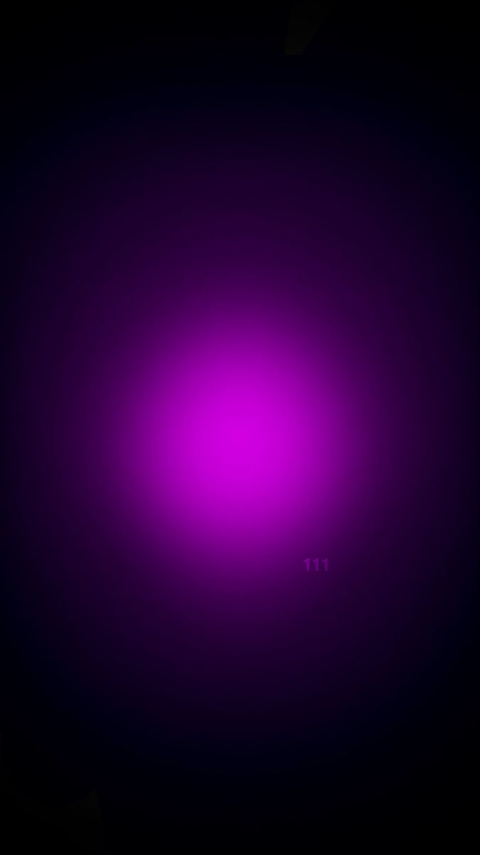 an abstract purple background with some black dots