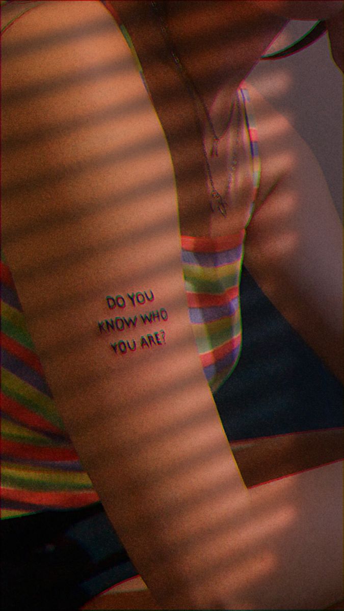 a person with a tattoo that says do you know what you are doing?