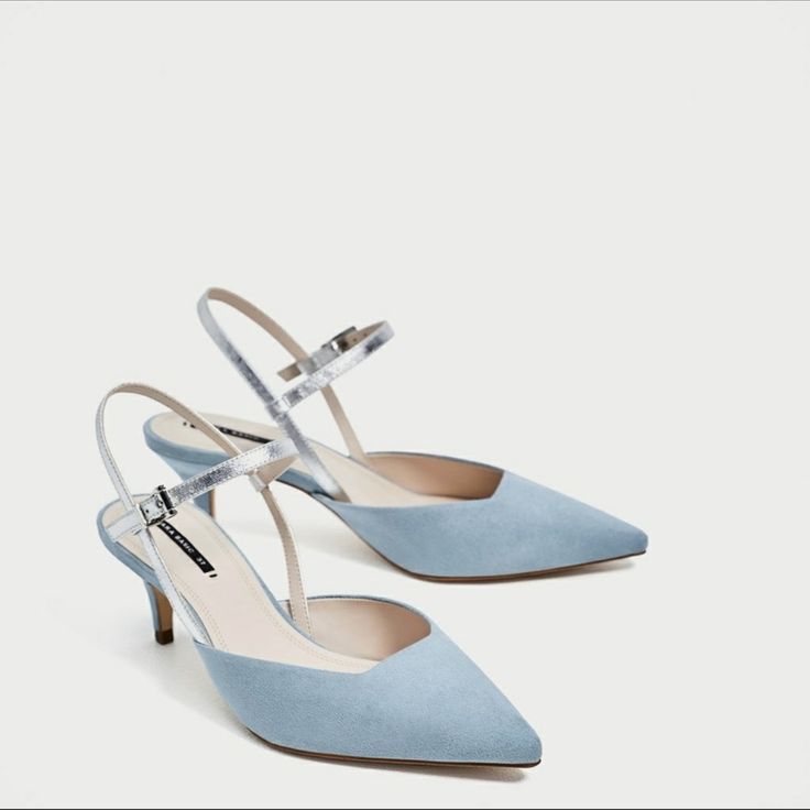 Blue, Kitten Heel, Slingback Shoes With Straps In Contrasting Colours And Buckled Strap Around The Ankle. Heels Height 2.5” New With Tag Tag Size Eu40/Us9 Upper 75% Polyester, 25% Polyurethane Lining 100% Polyurethane Sole 100% Polyurethane Thermoplastic Slipsole 90% Polyurethane, 10% Polyester S61 Chic Silver Slingback Pumps With Open Heel, Silver Slingback Pumps With Heel Strap, Silver Open Heel Slingback Pumps With Heel Strap, Blue Ankle Strap Slingback Pumps With 4-inch Heel, Blue Slingback Pumps With 4-inch Heel For Evening, Silver High Heel Slingback Pumps With Strap, Chic Silver Ankle Strap Slingback Sandals, Silver High Heel Slingback Sandals, Blue Open Heel Slingback Pumps For Evening