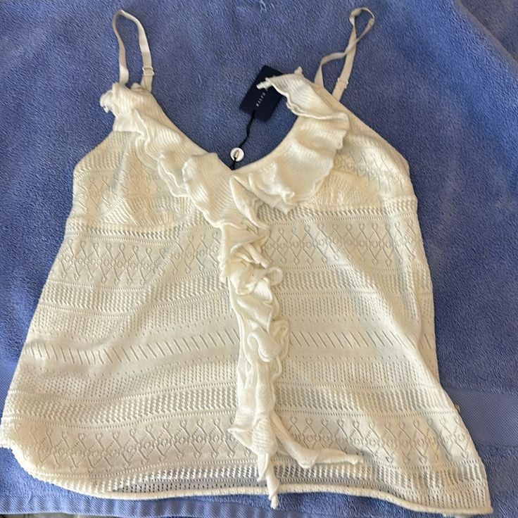 Nwt, Never Been Worn, Cream Colored Cami With Ruffle Down The Front. Super Soft, Almost Looks Crocheted. Adjustable Straps At Shoulders. Elegant Knit Tops For Beach, Spring Ralph Lauren Knit Tops, White Ralph Lauren Summer Top, Ralph Lauren Sleeveless Summer Tops, Ralph Lauren White Summer Top, Chic Ralph Lauren Summer Tops, Ralph Lauren Tops, Cream Color, Adjustable Straps