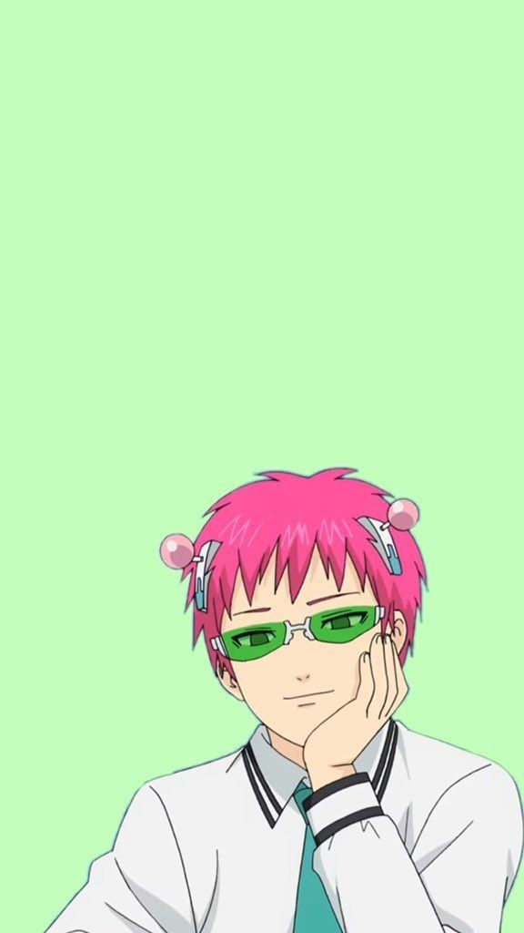 a man with pink hair and green glasses sitting in front of a green wall wearing a tie