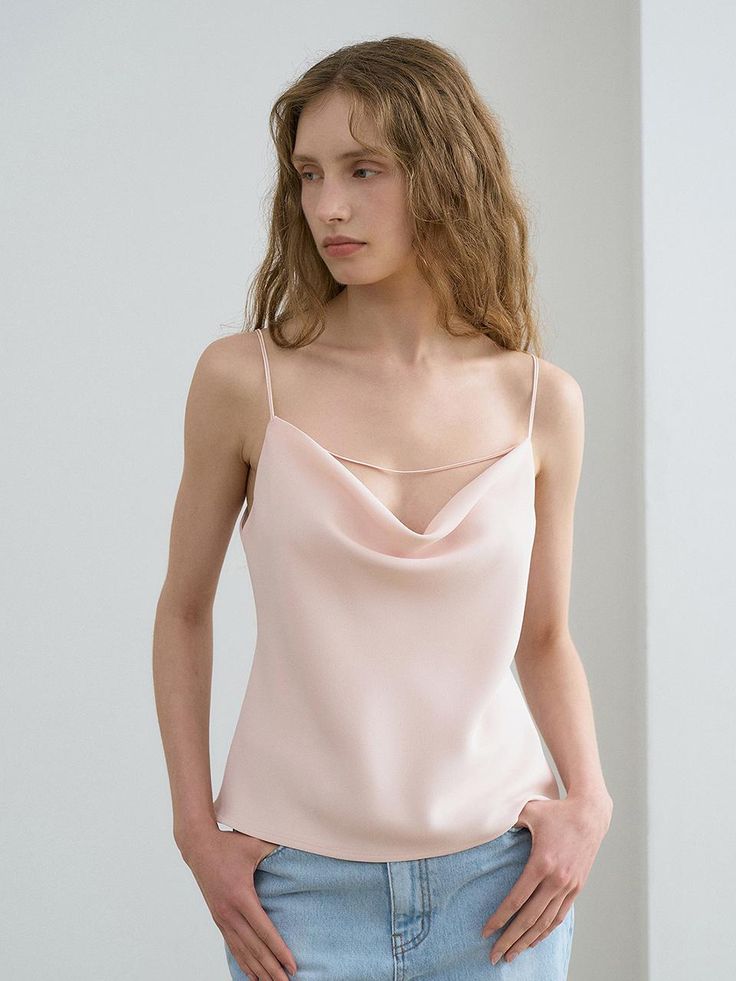 This is a trendy and feminine top by RENEJ that is made out of high quality and sturdy material. With distinctive mood of the design and comfortable wear, you can style it for your casual daily outfit.- Light crepe texture fabric- Natural drape on the neck- Unique and feminine mood Elegant V-neck Knit Top For Summer, Viscose V-neck Top For Day Out, Elegant Sleeveless Viscose Top, Elegant Summer Knit Top, Casual Summer Tops With Soft Texture, Elegant Fitted Knit Top For Spring, Chic Spring Knit Top, Chic V-neck Viscose Tank Top, Feminine Solid Tops For Spring