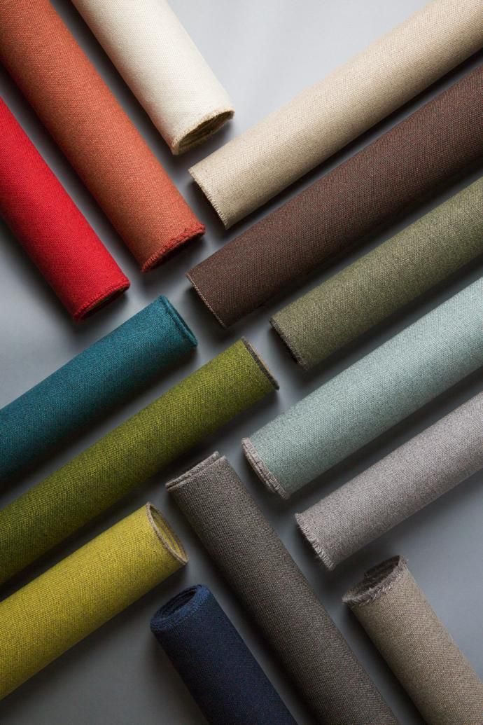 various colors of fabric on a white surface