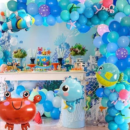 an under the sea birthday party with balloons and decorations