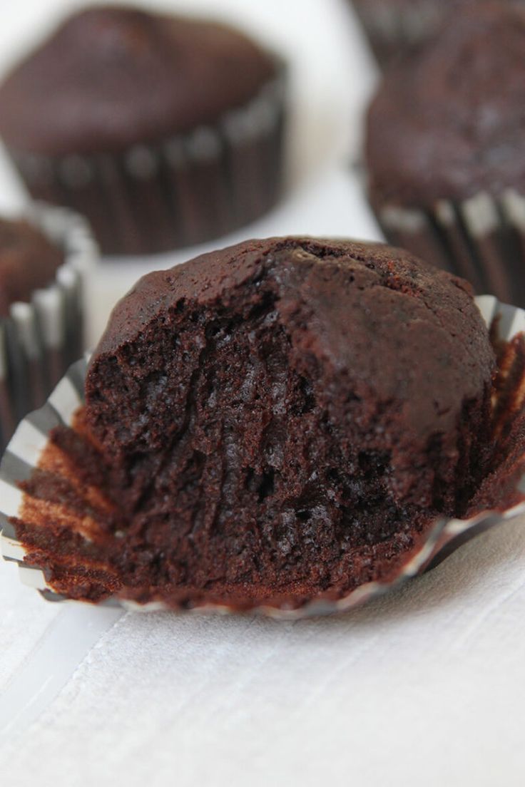 chocolate cupcakes sitting on top of each other