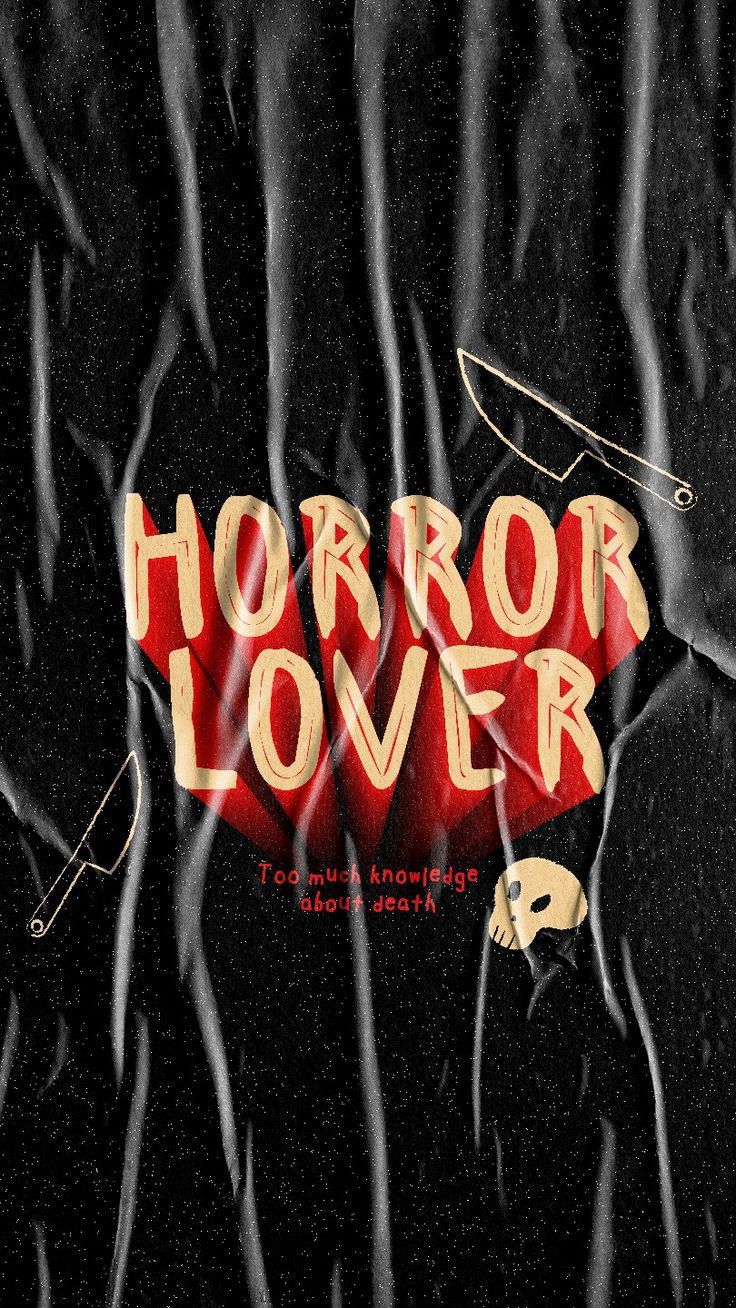 the title for horror lover, written in red and yellow letters on black paper with an image