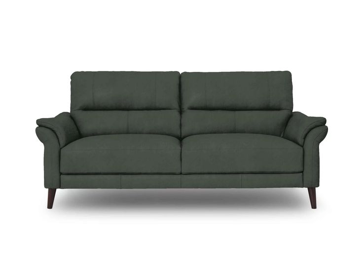 a green couch on a white background