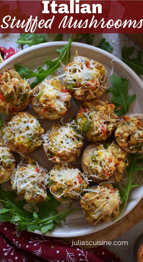 italian stuffed mushrooms on a plate with spinach and parmesan cheese