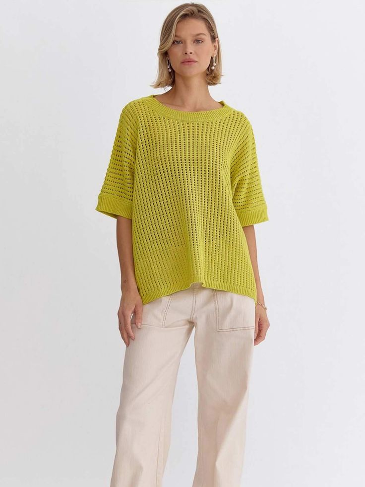 Our Chartreuse Crochet Short Sleeve Top offers a relaxed and chic style suitable for various occasions. Crafted from knit fabric, it provides comfort and breathability, making it ideal for throwing on after a beach day or pairing with white denim. Featuring a boatneck and oversized fit, it exudes effortless elegance and versatility. Whether worn on vacation or layered over a t-shirt dress for added warmth and style, this top is a perfect choice for your wardrobe. SIZE & FIT Fit is true to size M Casual Yellow Chunky Knit Top, Casual Yellow Crochet Top, Yellow Knitted Oversized Top, Crochet Short Sleeve Top, Chartreuse Sweater, Yellow Retro Knit Top, Crochet Short Sleeve, Crochet Short, Summer Concert