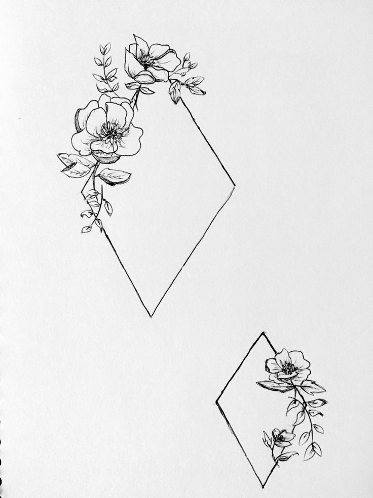 a black and white drawing of flowers on a piece of paper with a rectangle in the middle