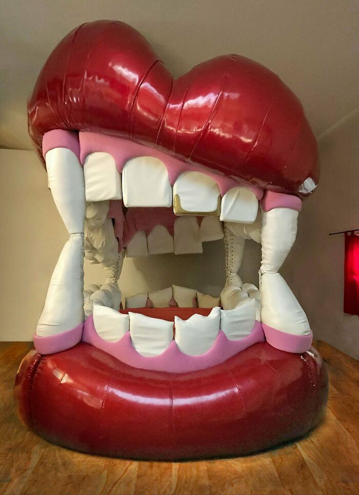 an inflatable red mouth with white teeth and gums on the upper part