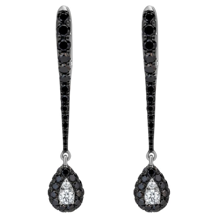 Manifested on an 18K White Gold, Black Rhodium body, this pair of dangling earring looks like an exclamation sign. Uniquely crafted by Luxle, this sleek pair of jewelry has round full-cut white and black diamonds in micro pave and illusion setting. The diamonds are I1 in clarity and GH, Black in color, weighing 1.36 Cts. Dramatic to look at, this pair of earrings is perfect for dressy gown or casual dress. Please follow the Luxury Jewels storefront to view the latest collections & exclusive one Dressy Gowns, Black Diamond Jewelry, Black Diamond Earrings, Black Diamonds, Fashion Jewelry Earrings, Diamond Drops, Black Rhodium, Diamond Drop Earrings, Micro Pave