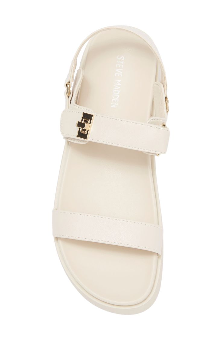 A strappy sandal is lofted by a platform for on-trend appeal in their everyday wardrobe. Synthetic upper/textile lining/synthetic sole Imported Trendy Synthetic Sandals With Adjustable Strap, Spring Flat Sport Sandals With Adjustable Strap, Spring Synthetic Strap Footbed Sandals, Modern Spring Footbed Sandals With Adjustable Strap, Spring Synthetic Sport Sandals With Strap, Trendy Spring Sport Sandals With Adjustable Straps, Summer Synthetic Strap Footbed Sandals, Modern Summer Footbed Sandals With Adjustable Straps, Modern Footbed Sandals With Adjustable Straps For Summer