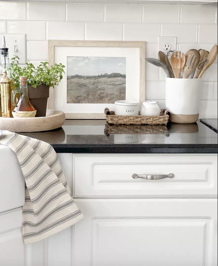 the kitchen counter is clean and ready to be used as a place for cooking utensils