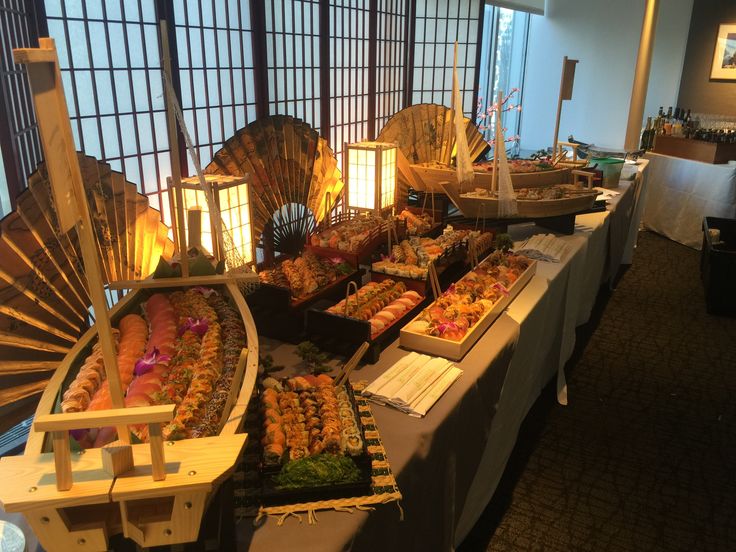 the buffet table is set up with many different foods