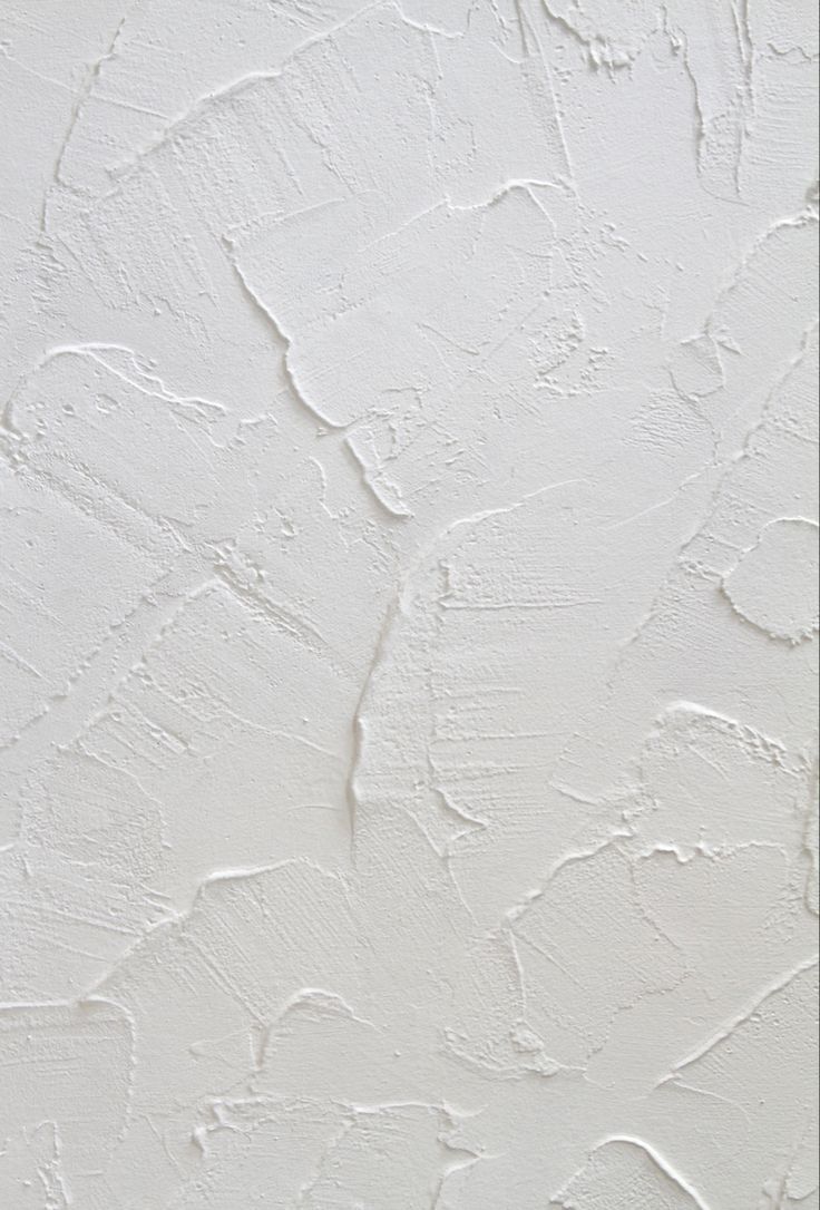 a white wall that has some paint on it