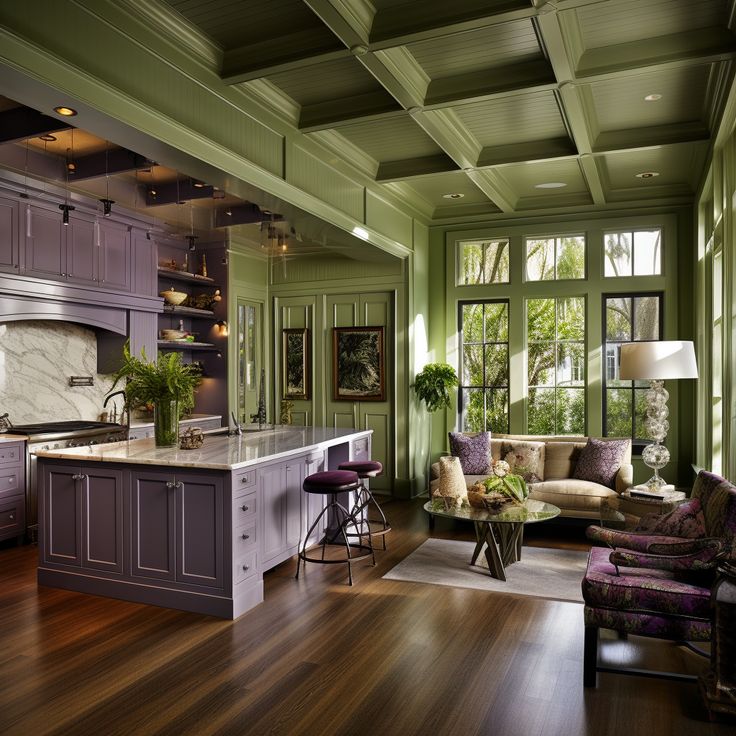 a living room filled with furniture next to a kitchen and breakfast nook in front of a large window