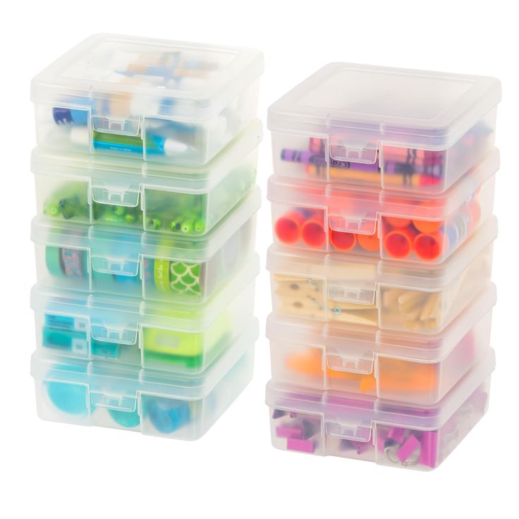 two plastic containers filled with lots of different colored beads