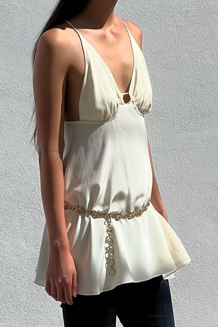 Show stopping, delicate and dainty, our Mini String Dress is inspired by one’s pre-teens, reimagined and crafted with pure luxurious silk combo, chiffon and crepe de chine. Elegant Backless Chiffon Mini Dress, Elegant Beige Chiffon Mini Dress, Chic Silk Chiffon Dress For Summer, Elegant Flowy Mini Dress, Chic Summer Silk Chiffon Dress, Elegant Silk Chiffon Dress For Spring, White Silk Chiffon Dress For Spring, Elegant Off White Silk Dresses, White Silk Chiffon Spring Dress